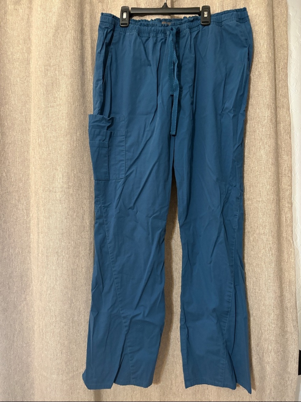Jaanuu Women's original flare Scrub Pants in Caribbean blue